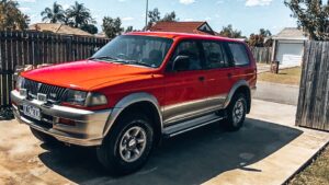 88 days of farm work – Image of red 4×4 car 88 days of farm work - Image of red 4x4 car