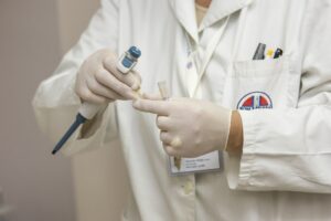 Doctor Image of doctor using stethoscope - Moving to Australia on WHV