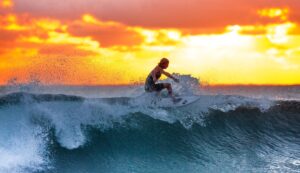 Surfer riding a wave Image of surfer riding a wave - Moving to Australia on WHV
